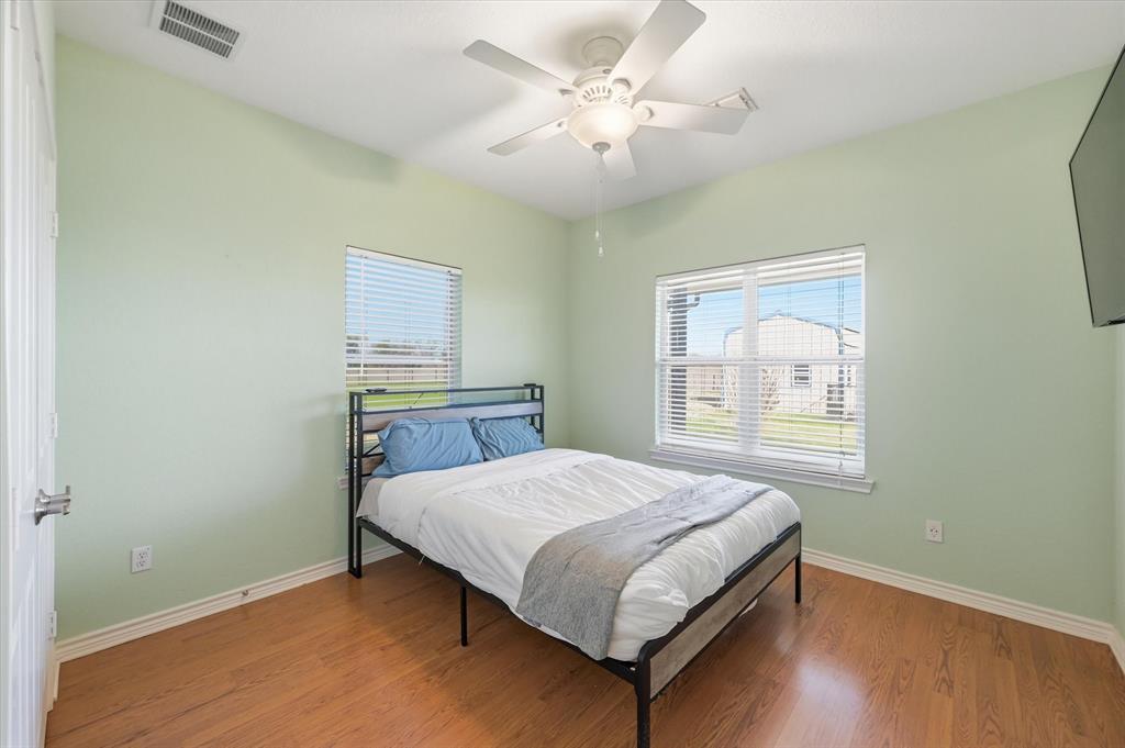 1616 Nash-Howard Road Waxahachie, TX 75165 - Photo 20 of 36 a bedroom with a bed and a window