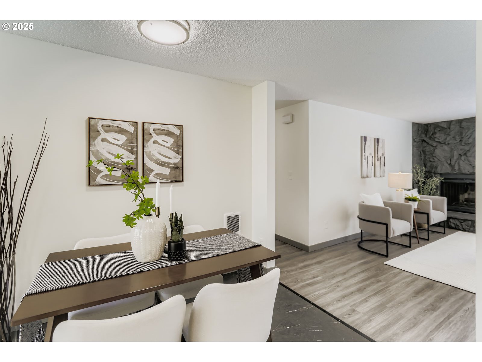 650 Southwest Meadow Drive, Unit 106 Beaverton, OR 97006 - Photo 11 of 29 a living room with furniture and a table
