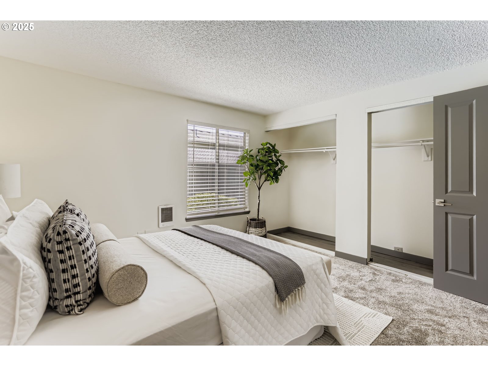 650 Southwest Meadow Drive, Unit 106 Beaverton, OR 97006 - Photo 14 of 29 a bedroom with a bed and a couch