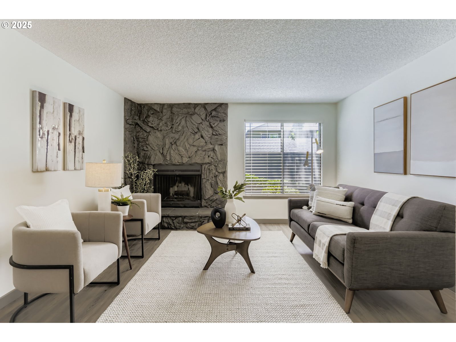 650 Southwest Meadow Drive, Unit 106 Beaverton, OR 97006 - Photo 6 of 29 a living room with furniture and a fireplace