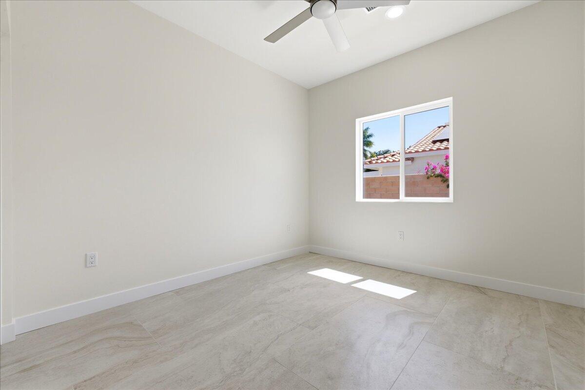 68160 Modalo Road Cathedral City, CA 92234 - Photo 20 of 57 an empty room with windows