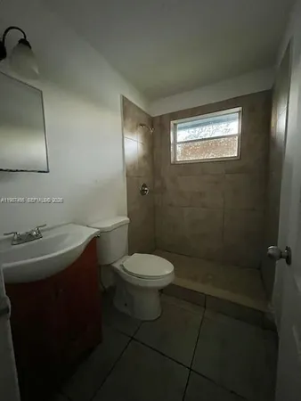 a view of a room with a window