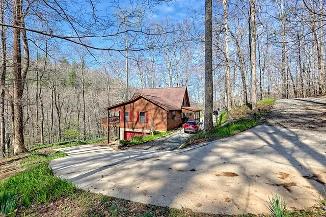 a kitchen with stainless steel appliances a sink a stove and a refrigerator