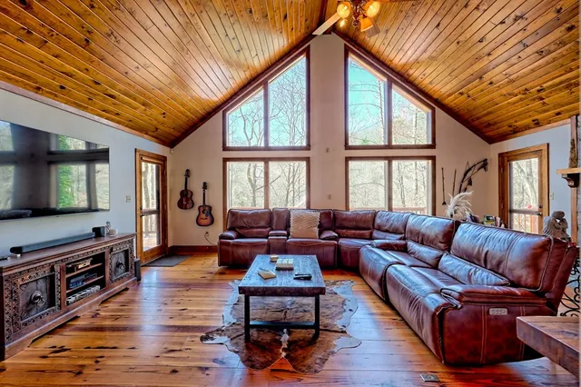a kitchen with stainless steel appliances a sink and cabinets