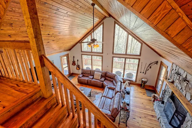 a bathroom with a sink a toilet and shower curtain