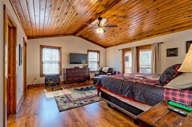 a view of a garage with a bike and car