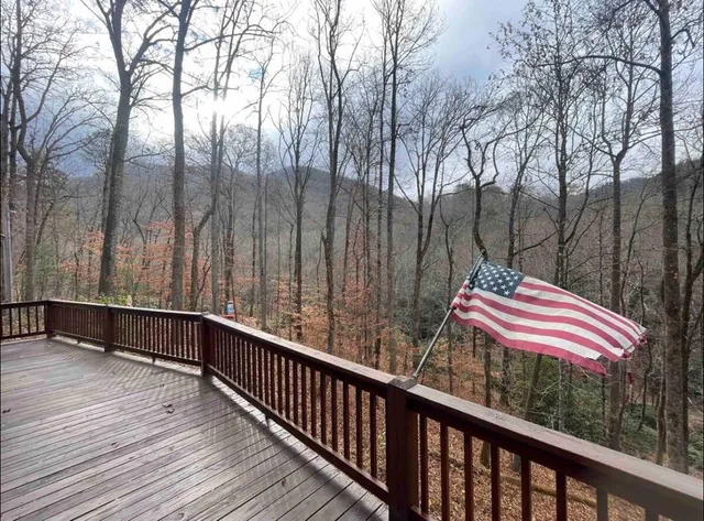 a kitchen with stainless steel appliances a stove a sink and cabinets