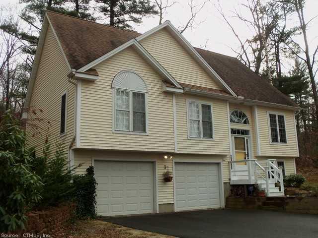 a view of a house with a garage