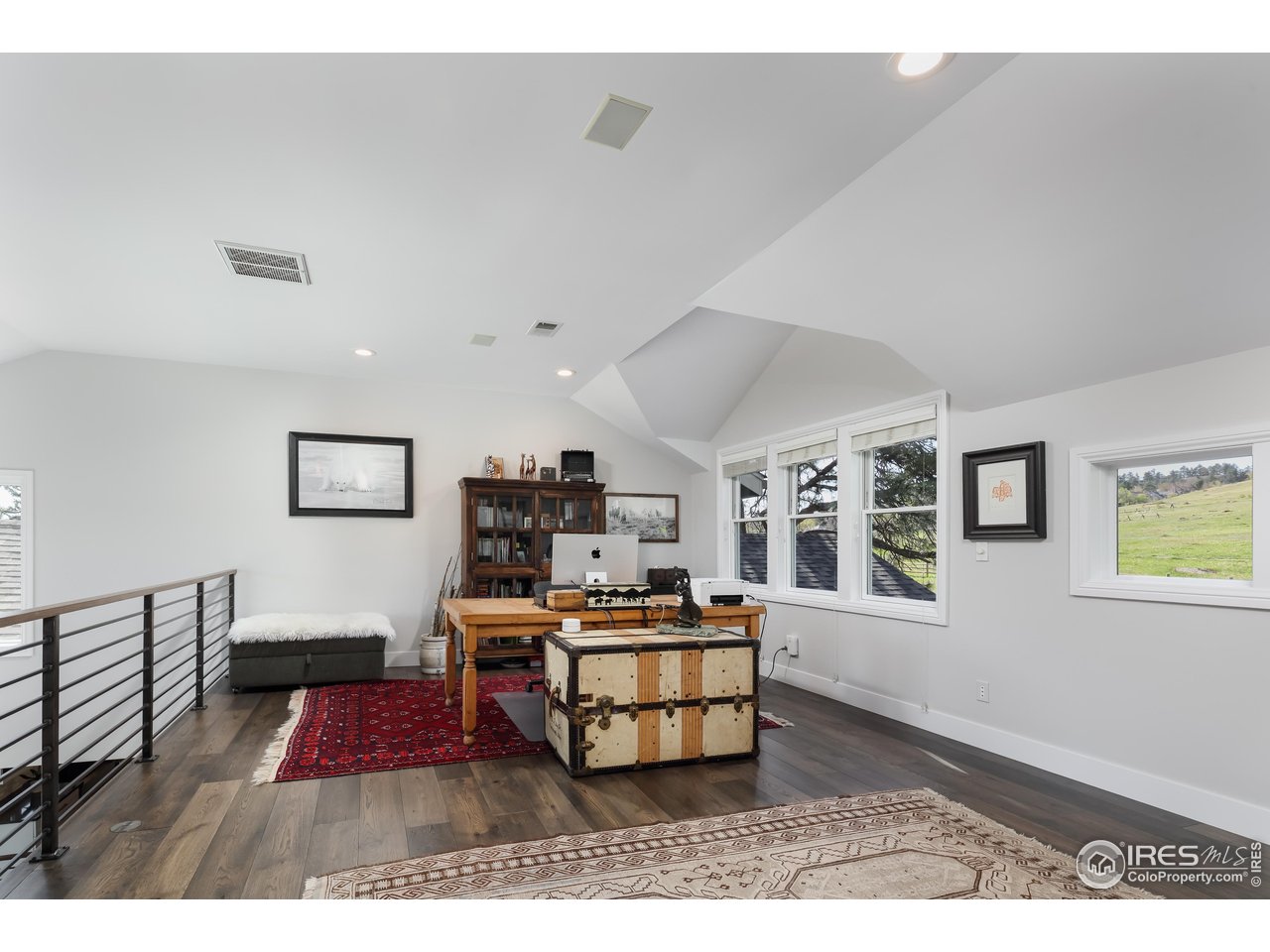 709 Baseline Road Boulder, CO 80302 - Photo 18 of 40 a living room with furniture and a flat screen tv