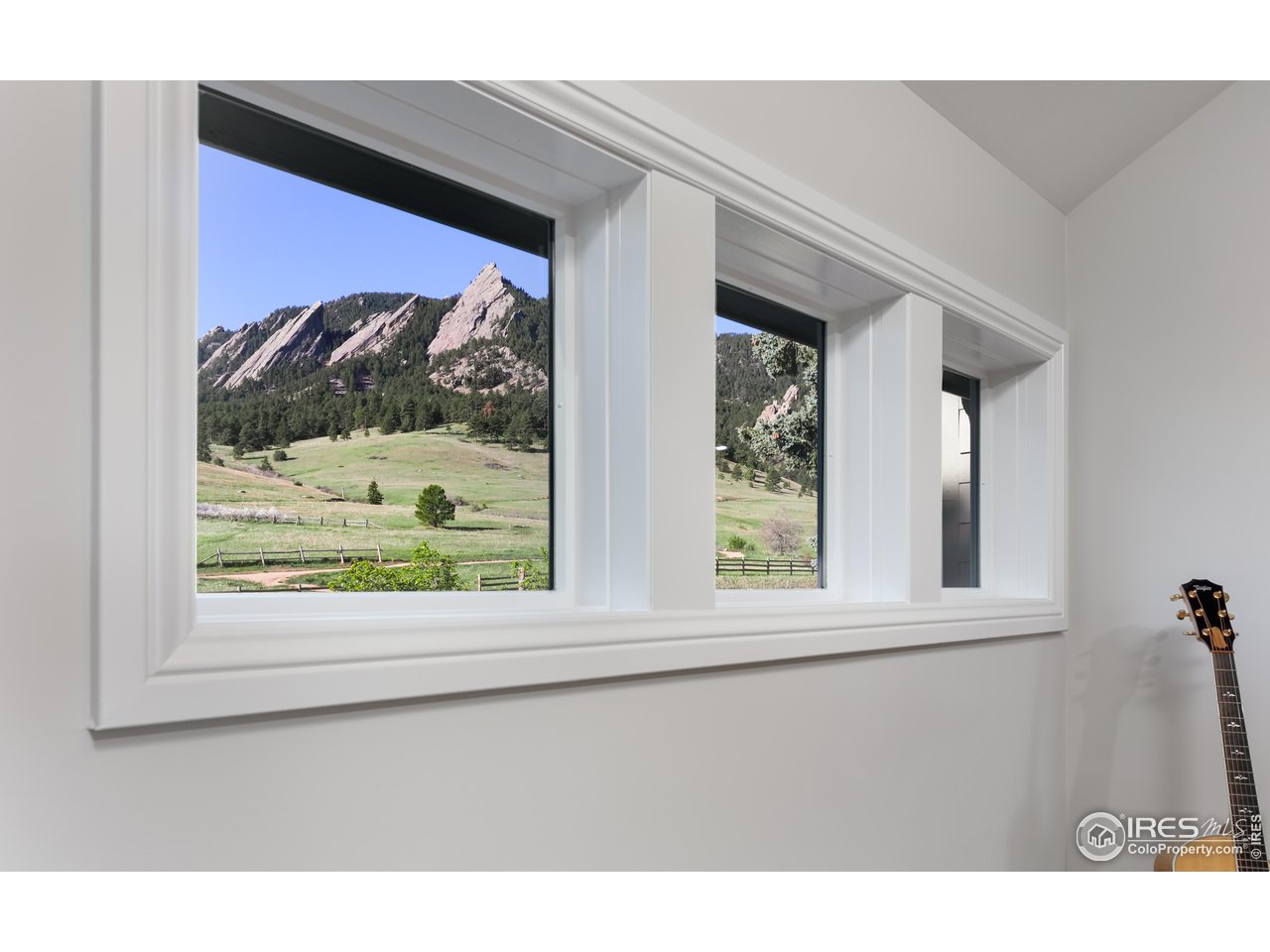 709 Baseline Road Boulder, CO 80302 - Photo 20 of 40 a front view of a house with a yard
