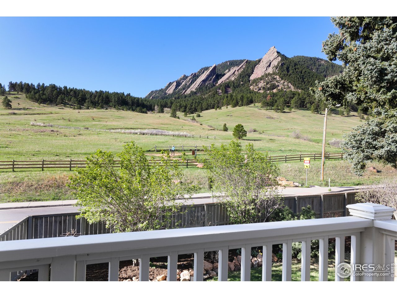 709 Baseline Road Boulder, CO 80302 - Photo 27 of 40 a view of a large building with a yard