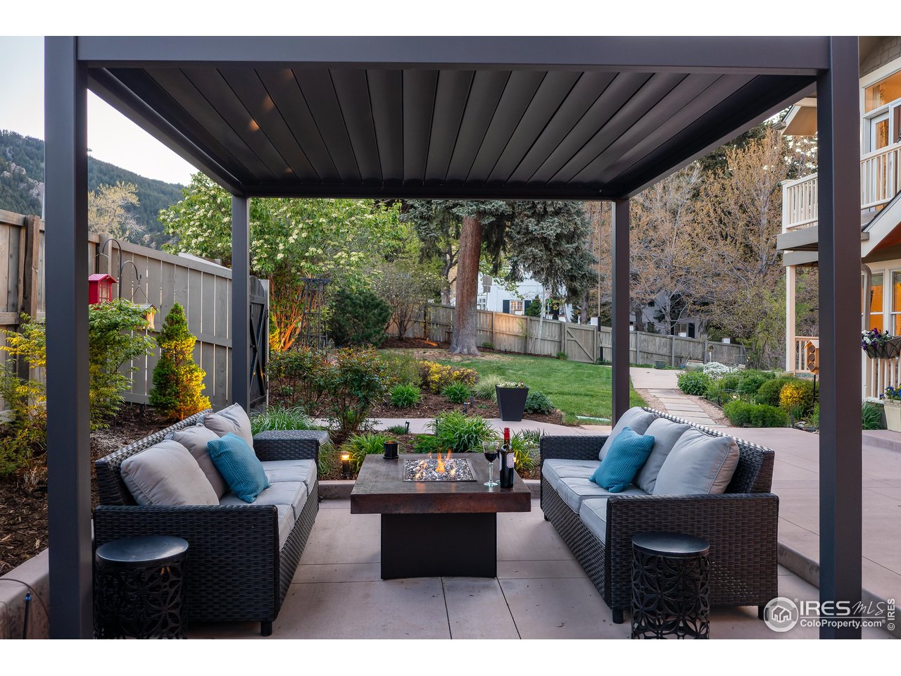 709 Baseline Road Boulder, CO 80302 - Photo 37 of 40 a view of a patio with couches plants and backyard