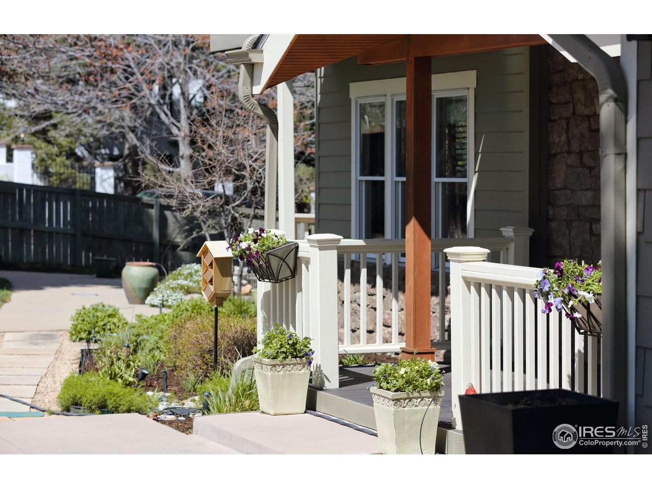 709 Baseline Road Boulder, CO 80302 - Photo 5 of 40 a view of a house with a flower garden