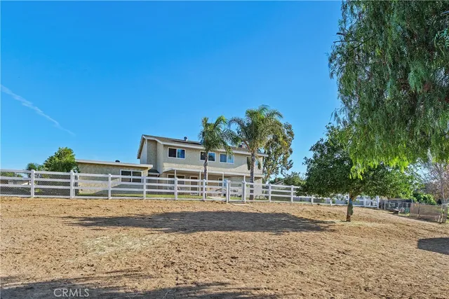 a house view with a lake view