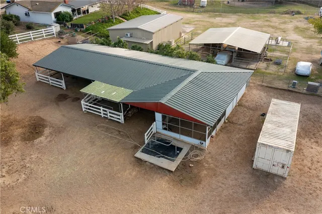 an aerial view of a house with wooden floor