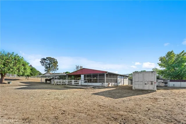 a aerial view of a house with a yard