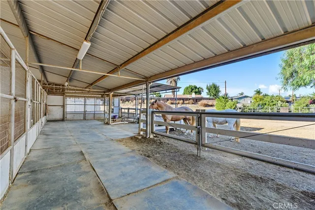 a view of a backyard with sitting area