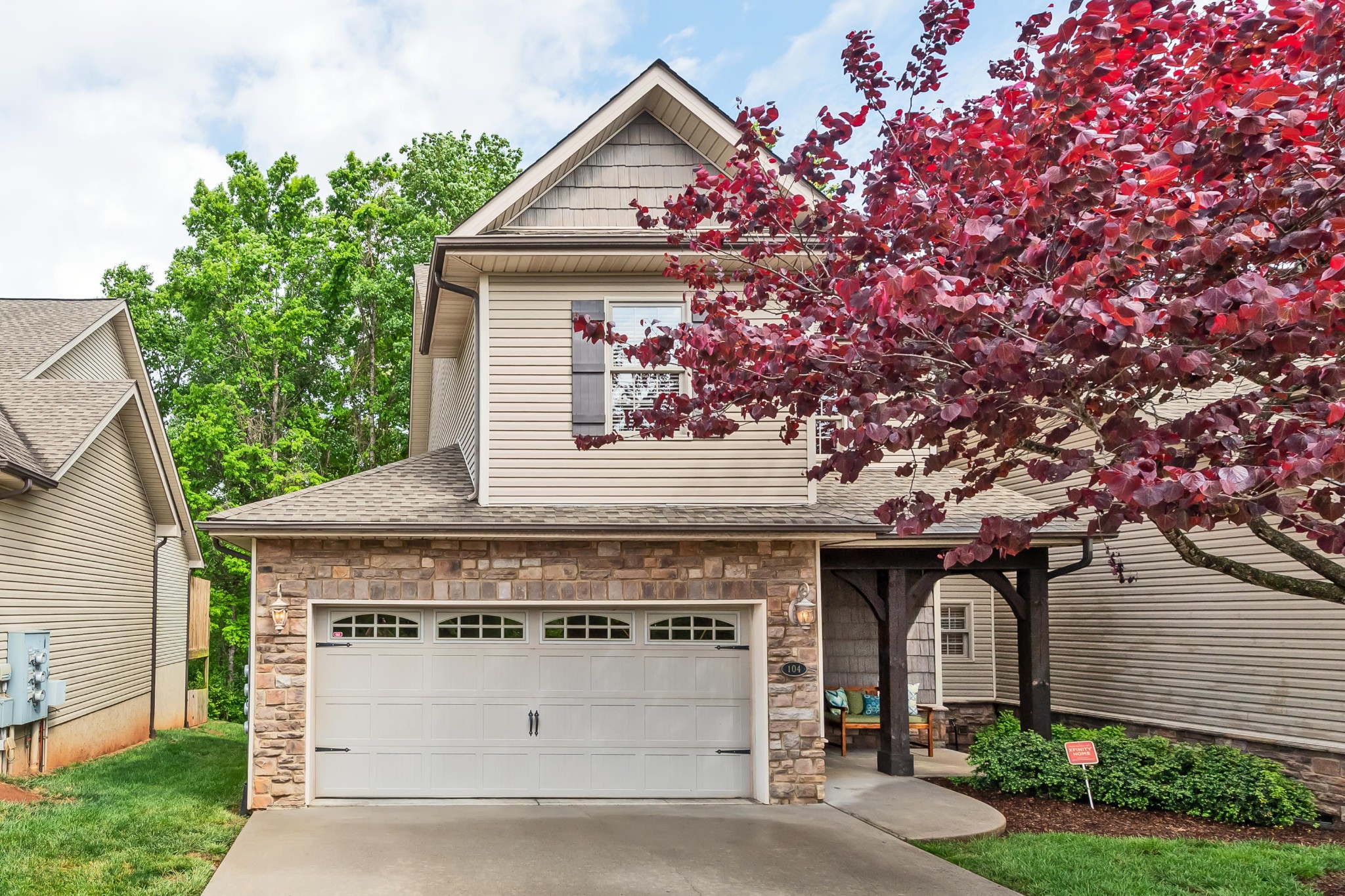 1833 Duncan Road, Unit 104 Knoxville, TN 37919 - Photo 1 of 36 a front view of a house with a garden