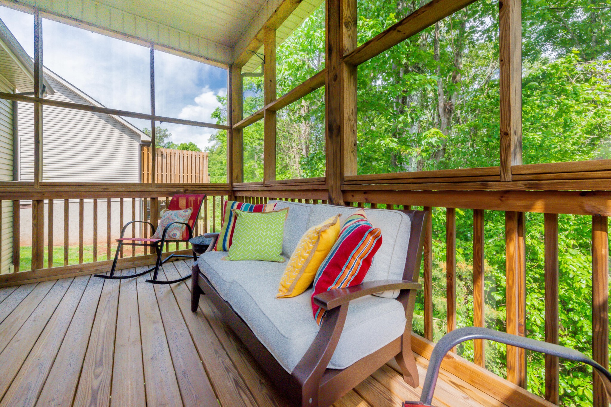 1833 Duncan Road, Unit 104 Knoxville, TN 37919 - Photo 13 of 36 a balcony with furniture and wooden floor
