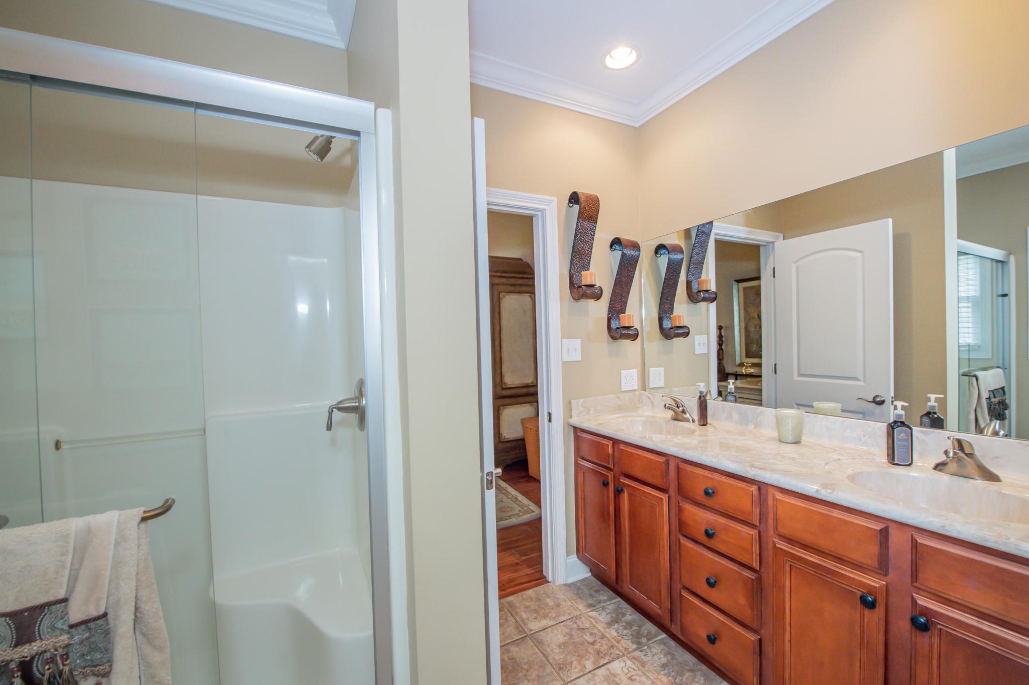 1833 Duncan Road, Unit 104 Knoxville, TN 37919 - Photo 20 of 36 a bathroom with a double vanity sink and mirror