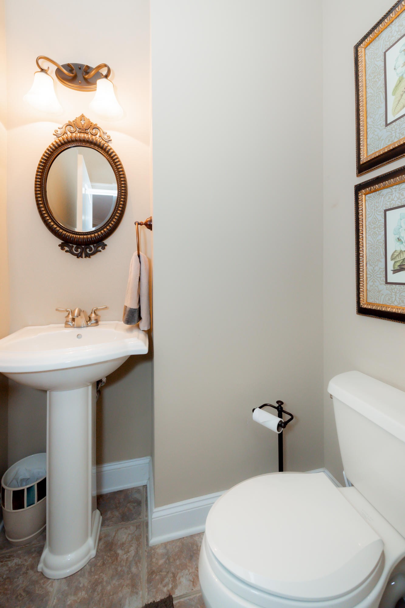 1833 Duncan Road, Unit 104 Knoxville, TN 37919 - Photo 23 of 36 a bathroom with a sink a mirror and a toilet