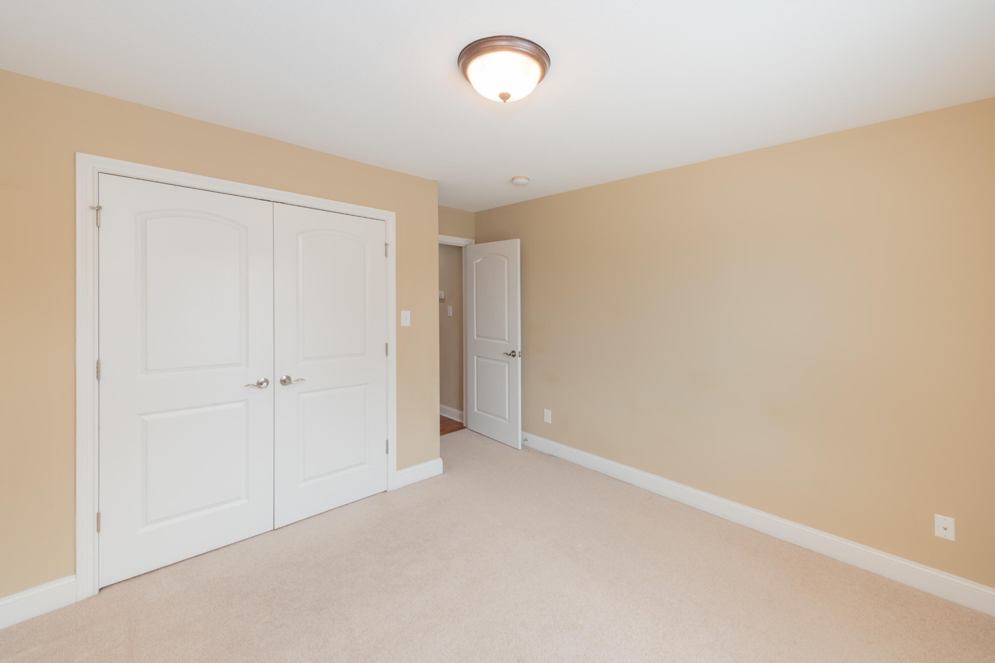 1833 Duncan Road, Unit 104 Knoxville, TN 37919 - Photo 29 of 36 an empty room with a door