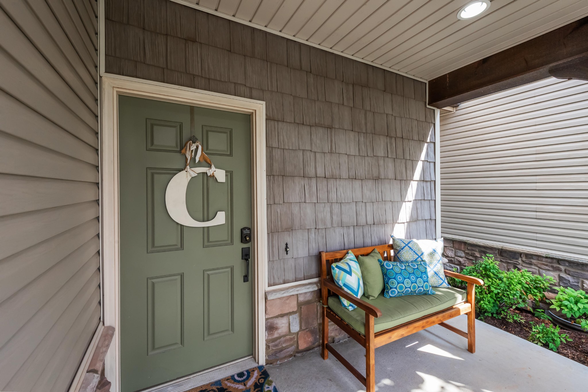 1833 Duncan Road, Unit 104 Knoxville, TN 37919 - Photo 5 of 36 a bench sitting in front of a door