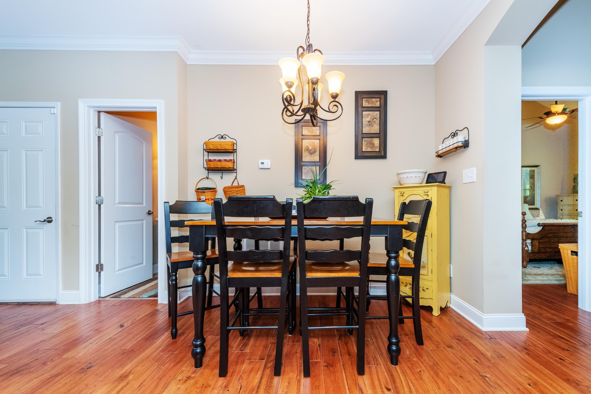 1833 Duncan Road, Unit 104 Knoxville, TN 37919 - Photo 9 of 36 a dining room with furniture and wooden floor