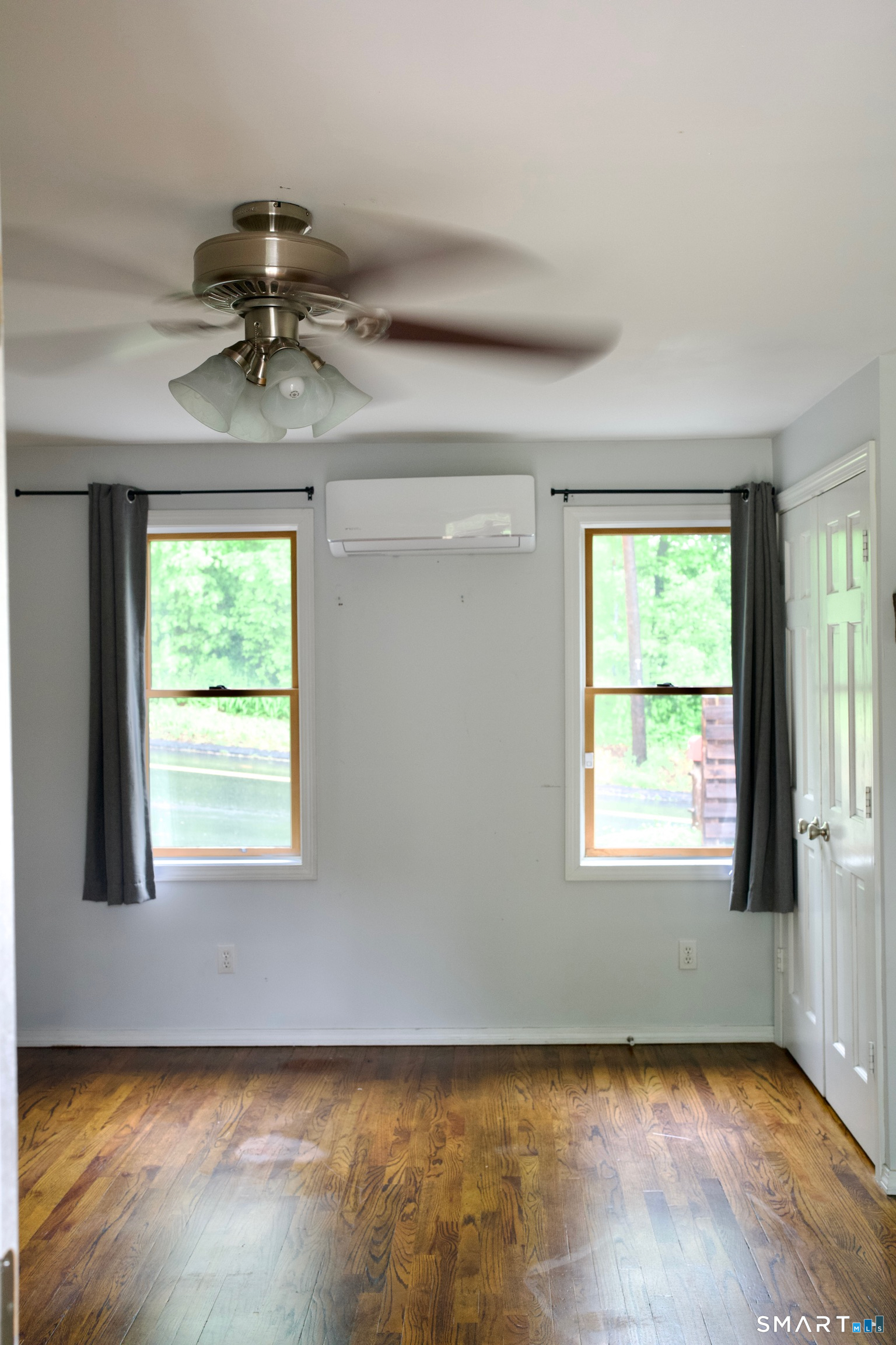 259 Peck Hill Road Woodbridge, CT 06525 - Photo 20 of 32 a view of an empty room and window