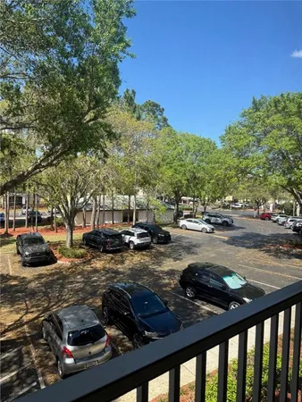 a view of a street with cars