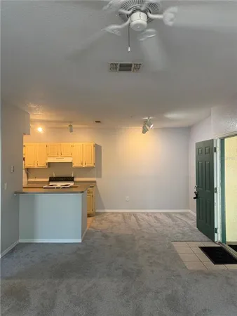 a view of a kitchen with a sink