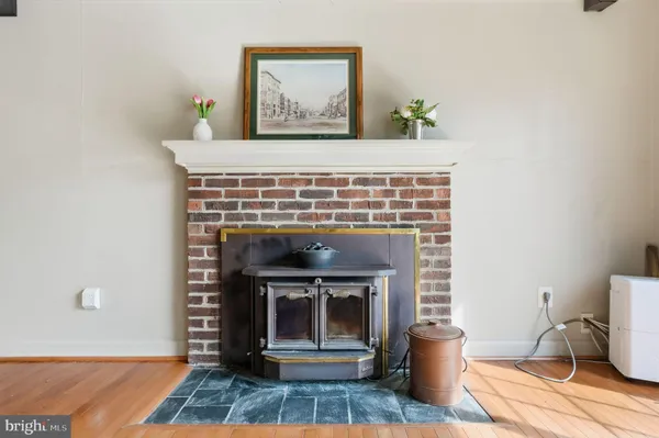 a kitchen with granite countertop a sink and a window