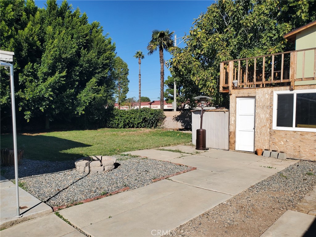 4459 Clarksdale Drive Riverside, CA 92505 - Photo 12 of 12 a view of a entrance gate of the house and trees