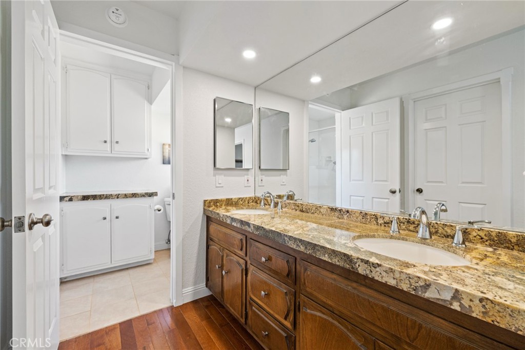 61116 Devils Ladder Road Mountain Center, CA 92561 - Photo 41 of 74 a bathroom with a granite countertop sink mirror and double