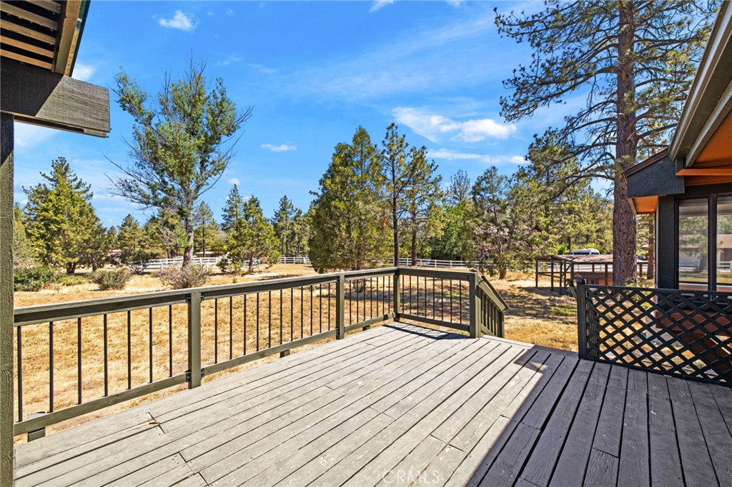 61116 Devils Ladder Road Mountain Center, CA 92561 - Photo 49 of 74 a view of balcony with wooden floor and fence