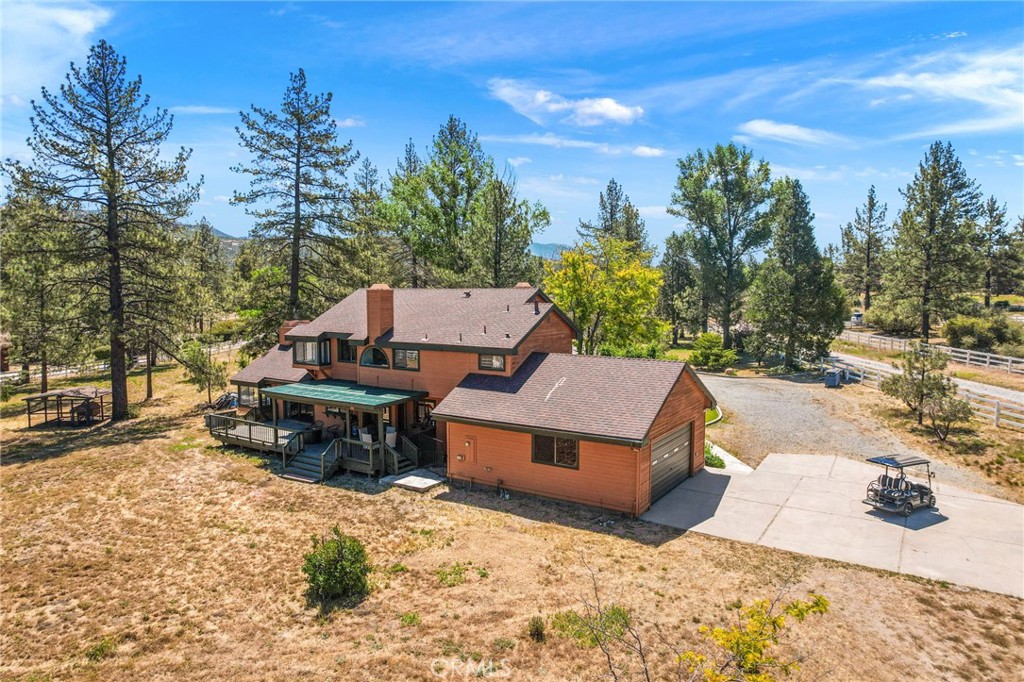 61116 Devils Ladder Road Mountain Center, CA 92561 - Photo 53 of 74 a view of a house with a yard