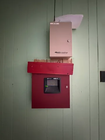 a view of a livingroom with wooden floor and a window