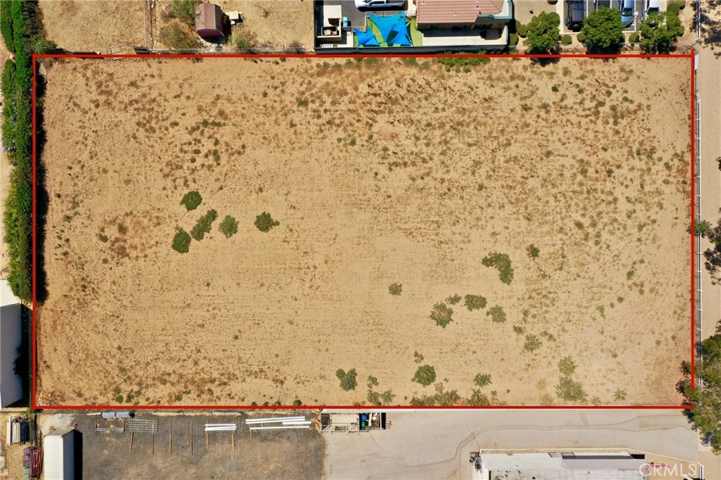 866 6th Street Norco, CA 92860 - Photo 17 of 17 view of a wooden floor and a bench in the background