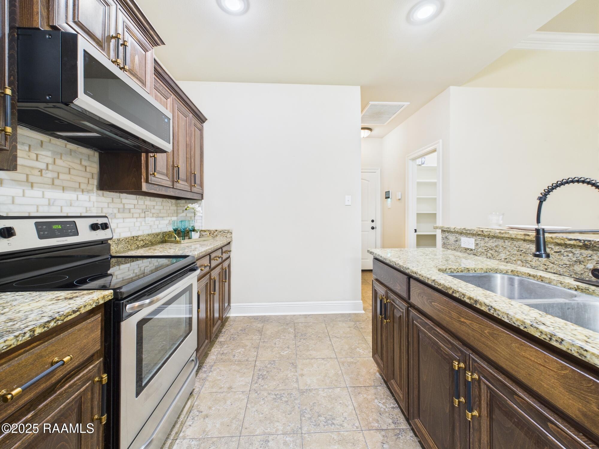 315 Arrowwood Road Youngsville, LA 70592 - Photo 8 of 19 CAM02220G0-PR0082-STILL008
