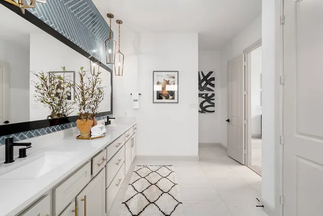 a kitchen with stainless steel appliances a refrigerator and a sink