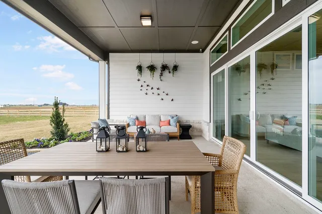 a view of a patio with swimming pool