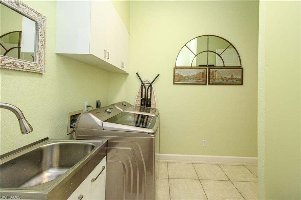 627 Soliel Drive Naples, FL 34110 - Photo 40 of 45 a close view of sink and tap