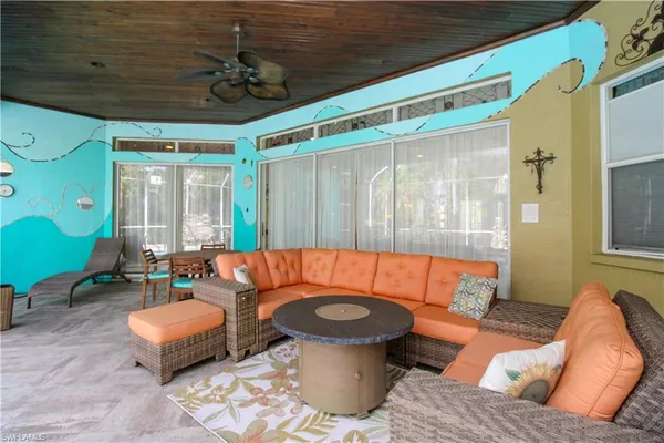 a outdoor living space with furniture and a potted plant