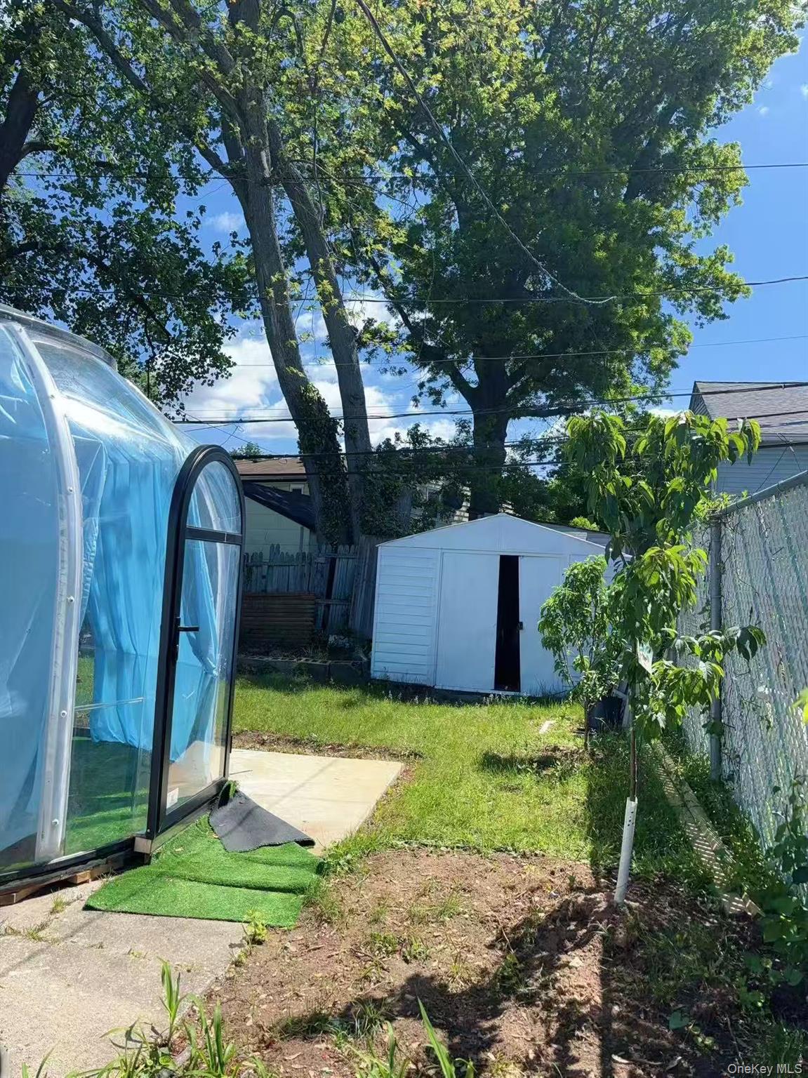 439 Newbridge Road East Meadow, NY 11554 - Photo 15 of 15 a view of a back yard