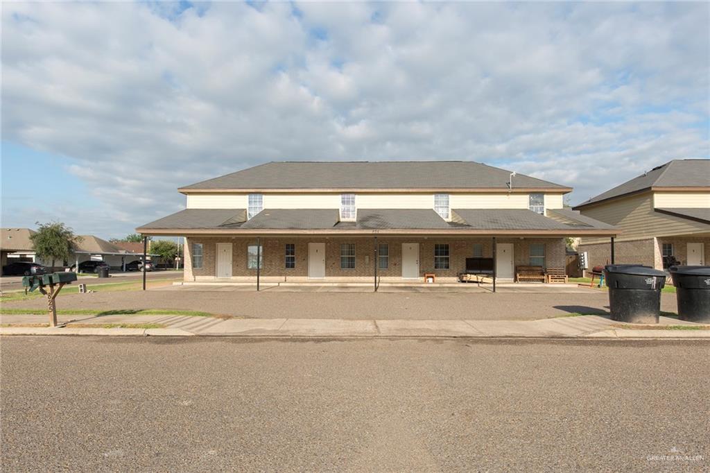 817 South Michigan Street Mission, TX 78573 - Photo 1 of 16 a front view of house with yard