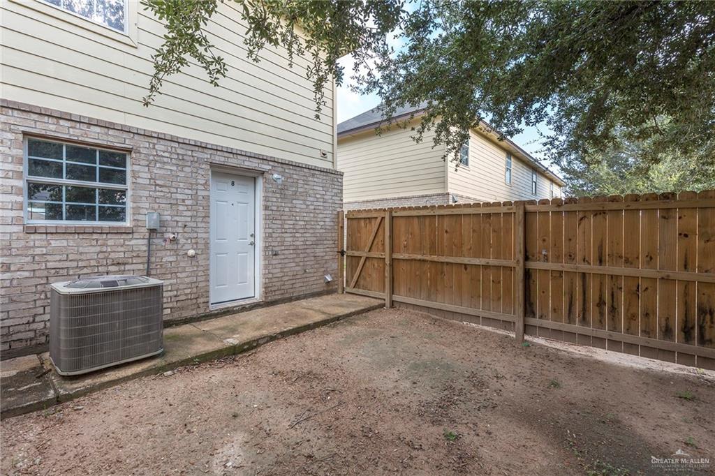 817 South Michigan Street Mission, TX 78573 - Photo 12 of 16 a view of backyard and wooden fence