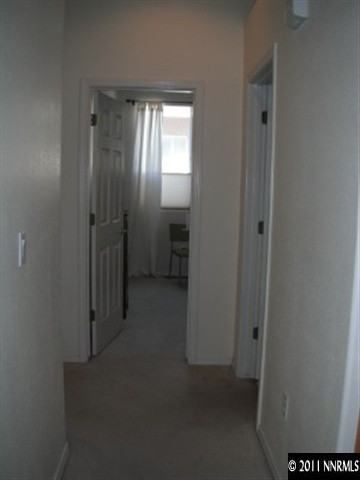 9911 Northrup Drive Reno, NV 89521 - Photo 7 of 13 a view of hallway with windows