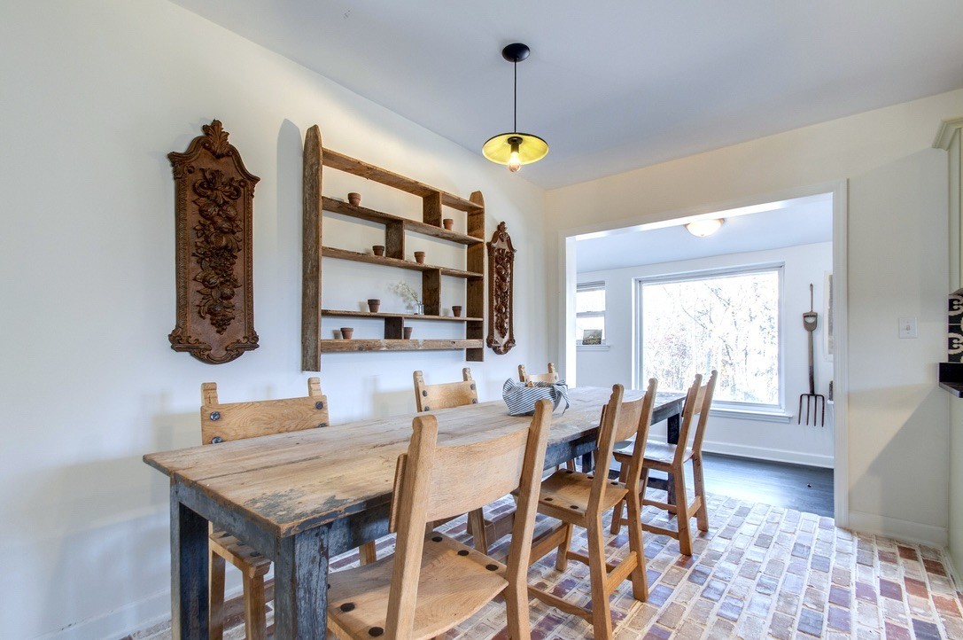 5570 Pinewood Road Franklin, TN 37064 - Photo 14 of 53 a view of a dining room with furniture and wooden floor