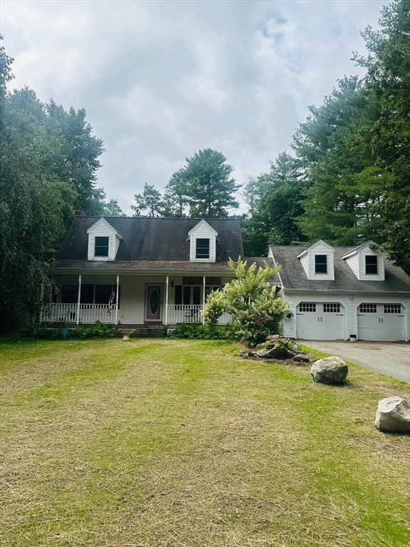 99 Old Poor Farm Road Ware, MA 01082 - Photo 1 of 29 a front view of a house with swimming pool