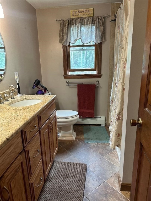 99 Old Poor Farm Road Ware, MA 01082 - Photo 20 of 29 a bathroom with a sink and a mirror